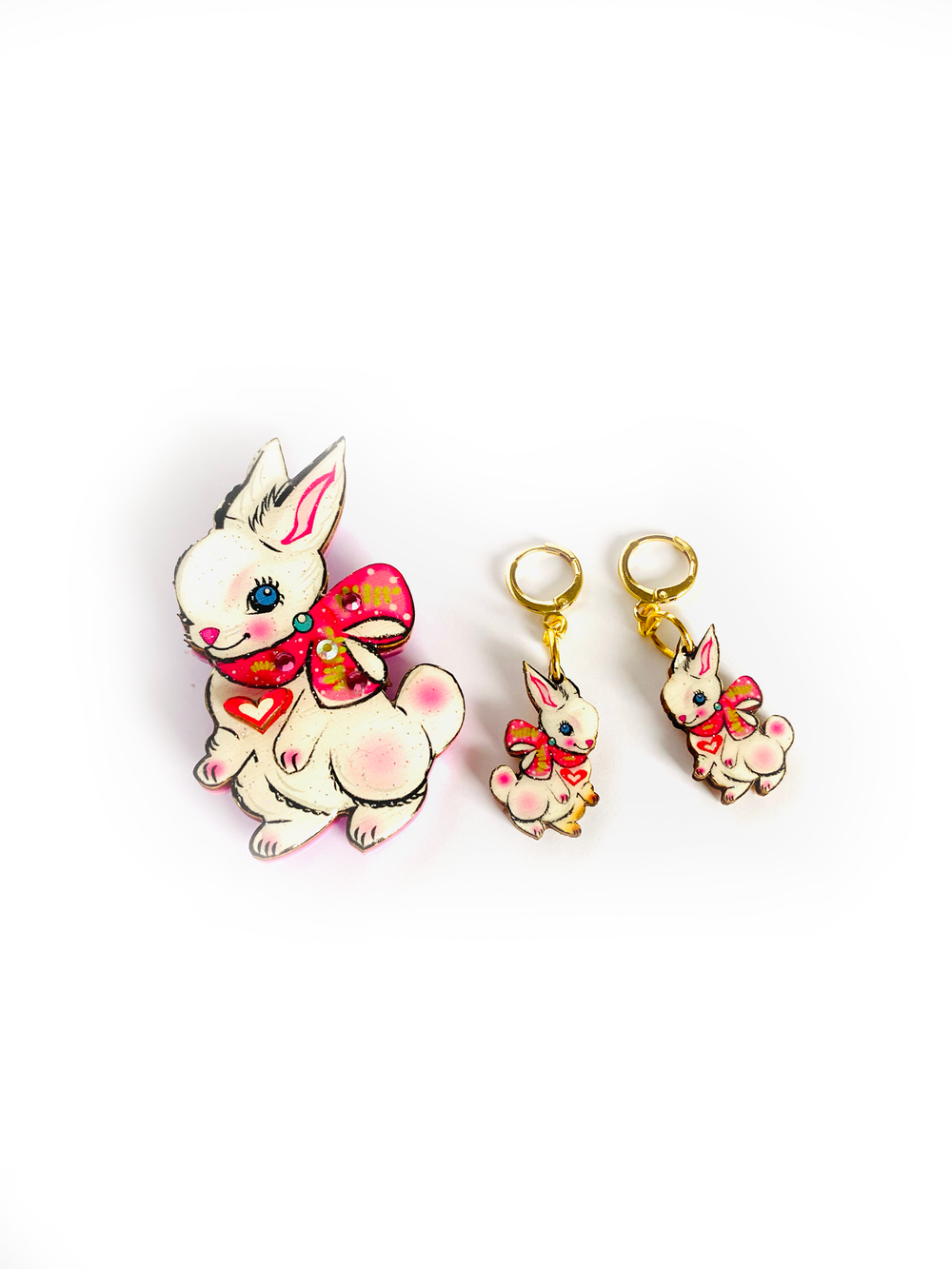 'Layla the magical bunny brooch' Welcome the lovely little Layla bunny brooch! Shes so magical and adorable with the little heart and prety scarf. Perfect for easter. Brooch basics * measurements 7cm x 5cm. * Certified woods/lasercut. * Stainless steel brooch back * Illustrated inhouse. * Resin cured. * Pastel * Perfect for spring * Bunny theme.. great easter gift!