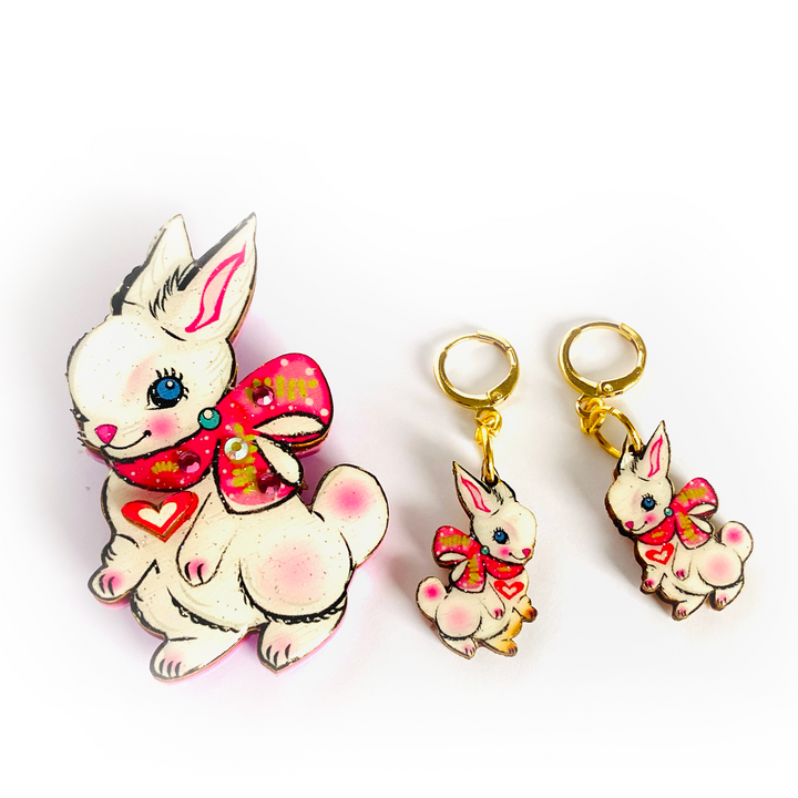 <p>'' Cute Easter rabbit drop earrings featuring Layla the magical little baby Bunny. Beautifully illustrated and incredibly comfy to wear. Brighten up your easter with these special pieces of unusual jewellery. Earrings basics * Measurement 6cm x 6xm * Bunny theme * Miss matched colours * Resin on woods creating a glass affect * Gold plated comfy huggie hoops * </p> <p>Layla the bunny huggie hoop earrings</p>