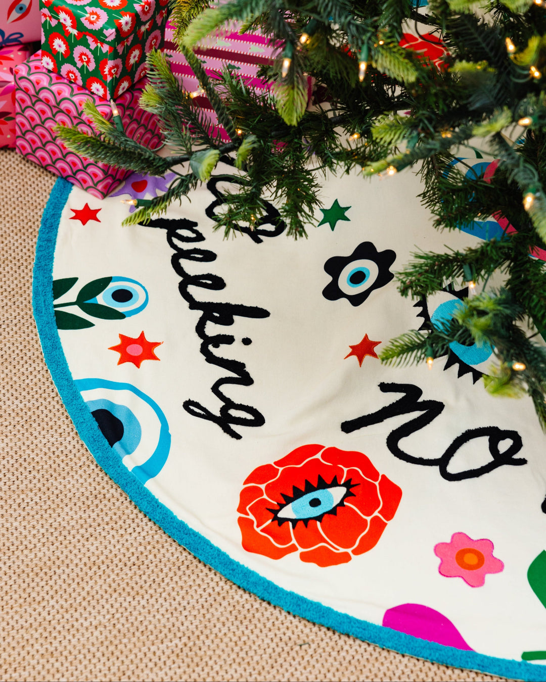 No Peeking Embroidered Tree Skirt