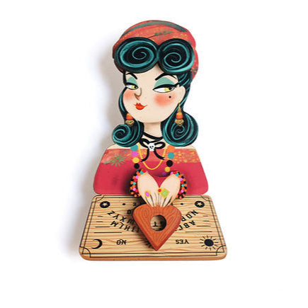Decorative wall hook with a colorful design of a woman and a heart on a white background