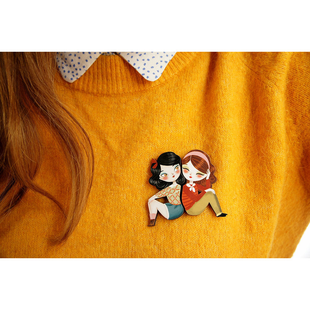 Puzzle with brunette girl brooch