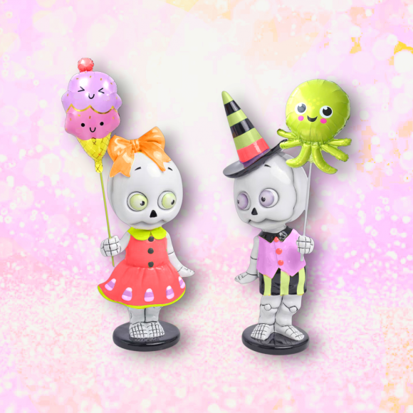 Set of two 13.5 inch summer skeleton kid figurines in swimwear, Summerween decor (alternate view)