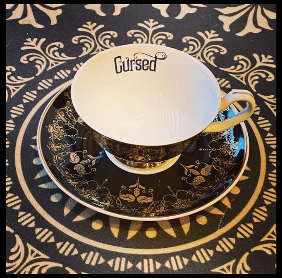 Black Nouveau Cursed Insult Teacup and Saucer by Miss Havisham