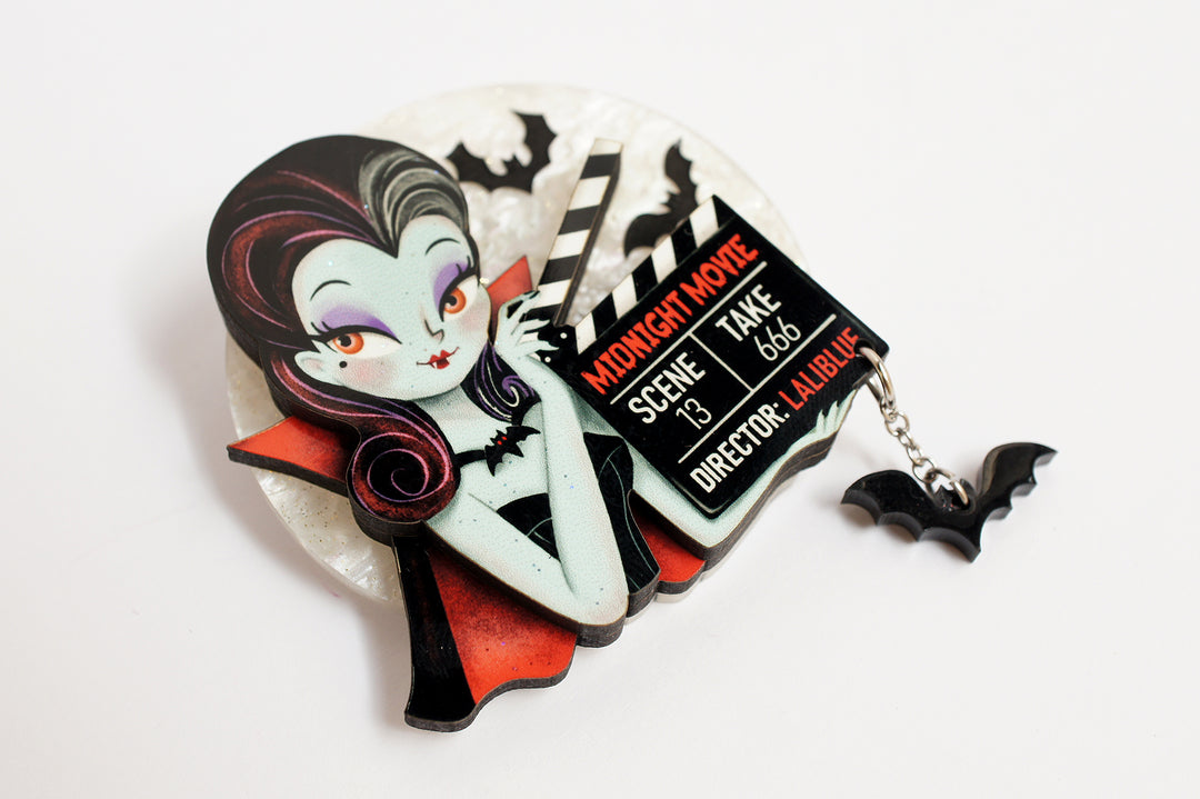 Vampire clapperboard brooch worn — layered acrylic Halloween cinema jewelry — LaliBlue Midnight Cinema