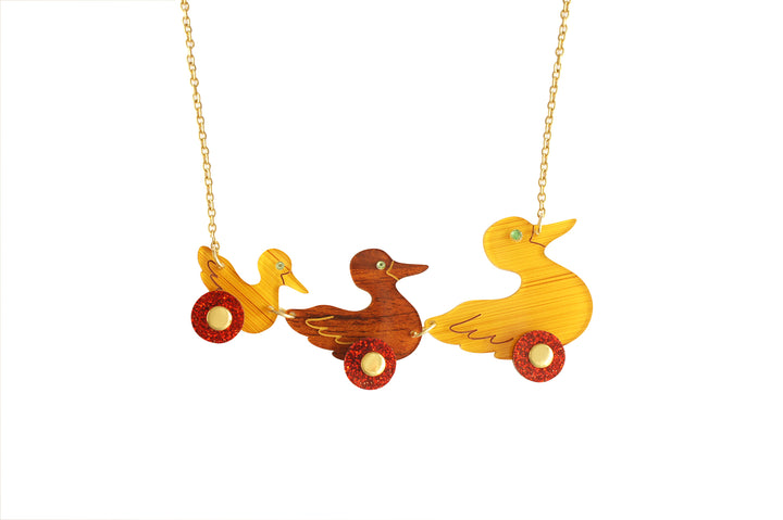 Ducks on wheels necklace by LaliBlue: Christmas jewelry, retro duck pull toy, spinning red wheels, vintage, acrylic jewelry, gold tone chain, pre-order