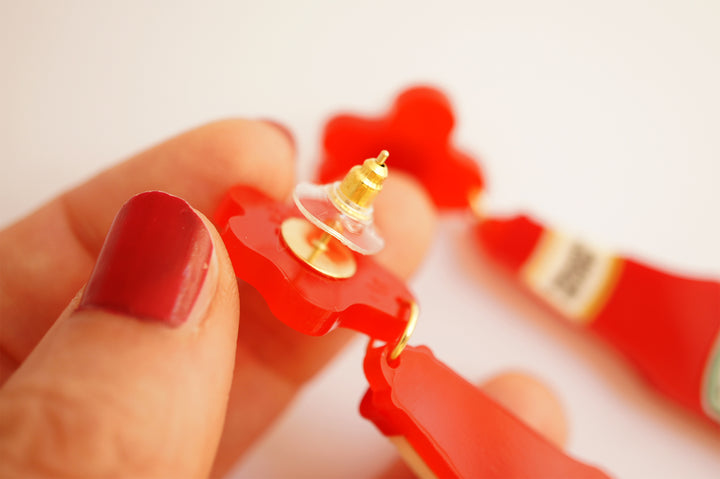 Ketchup blood bottle earrings size reference — horror movie novelty acrylic jewelry — LaliBlue Midnight Cinema