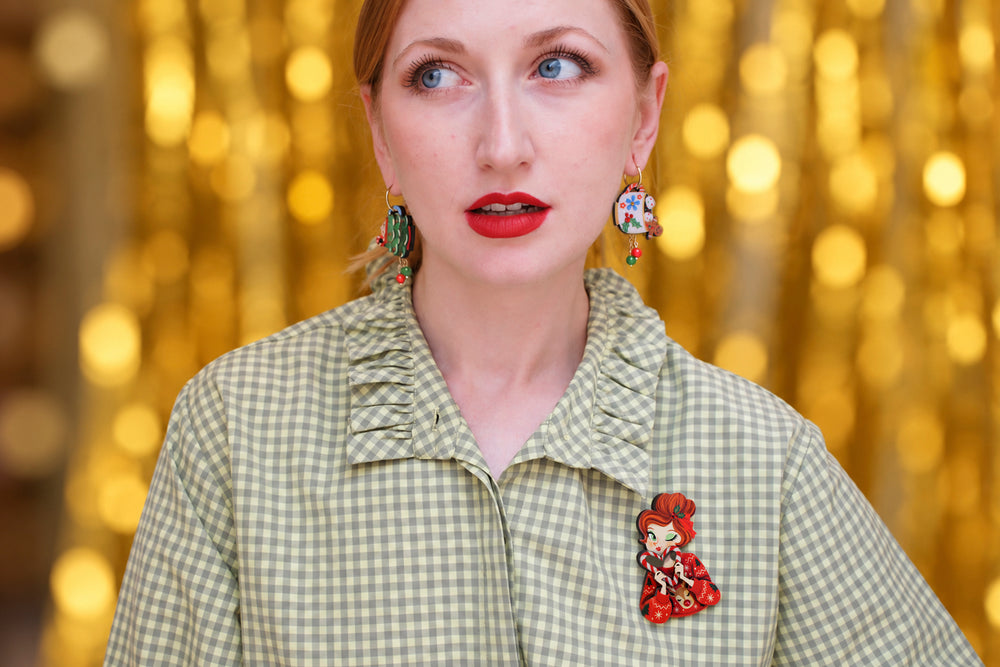 Candy cane girl brooch detail, LaliBlue Christmas jewelry, redhead, candy cane