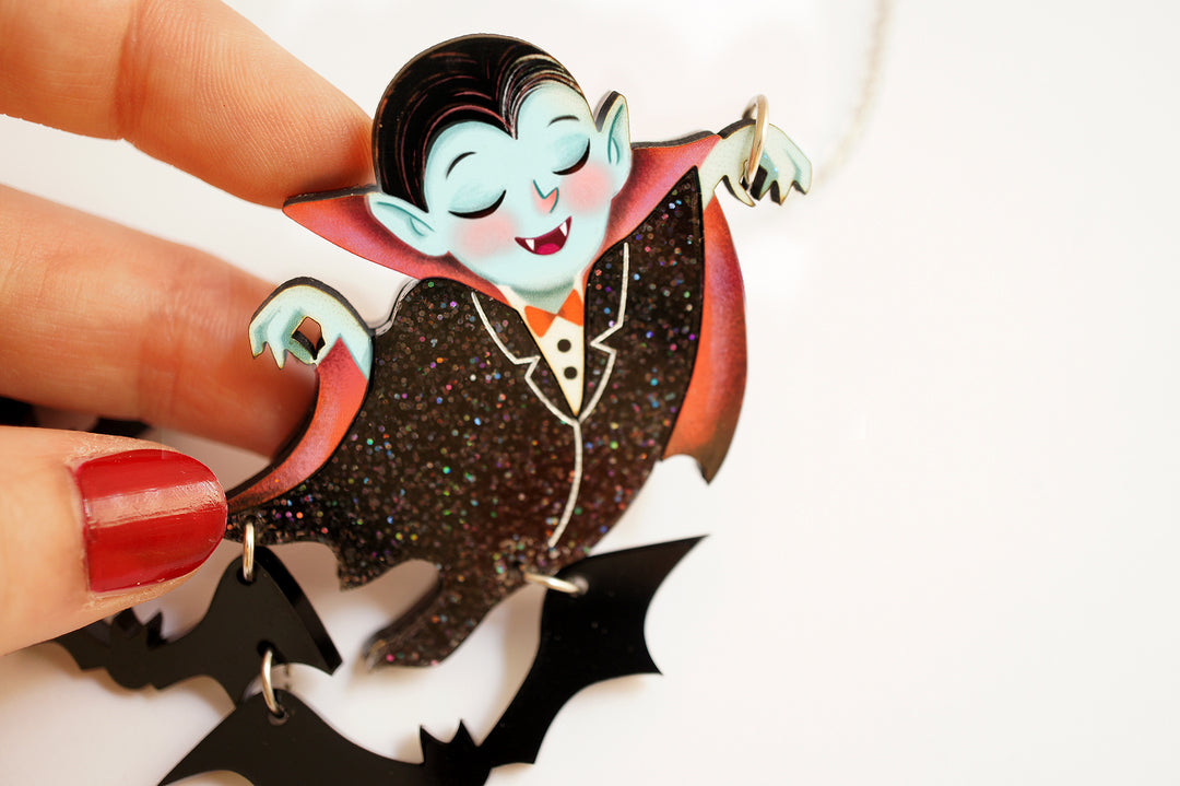 Dracula flying bats necklace worn — articulated Halloween acrylic illustrated wood jewelry — LaliBlue Midnight Cinema