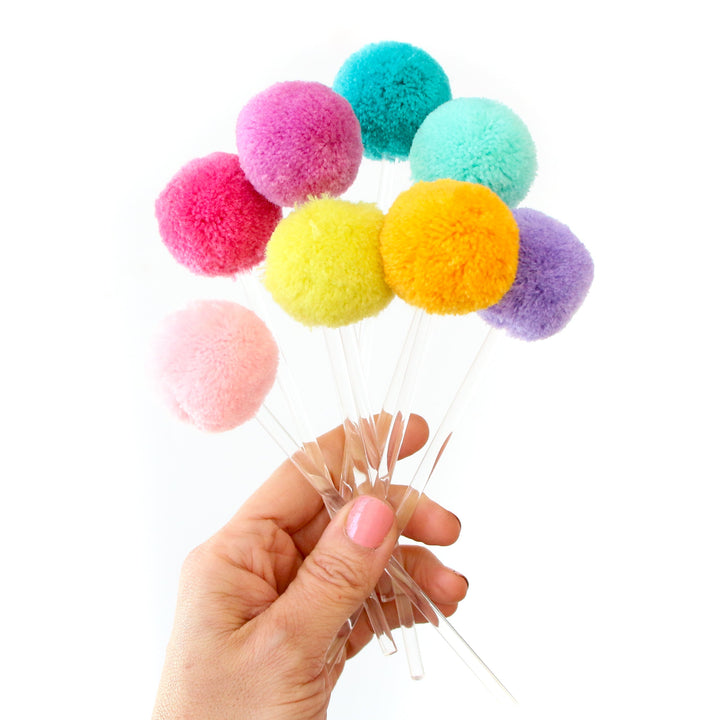 Rainbow set of pom pom cake toppers