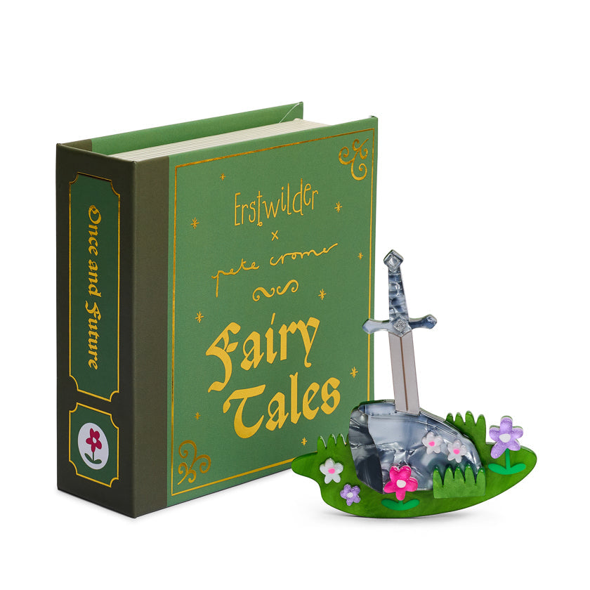 Green book titled 'Fairy Tales' with a sword and stone on a white background