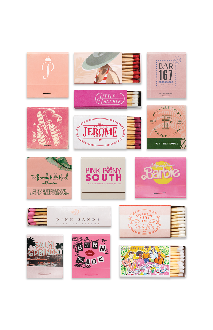 Collection of pink matchboxes with various designs and text on a white background