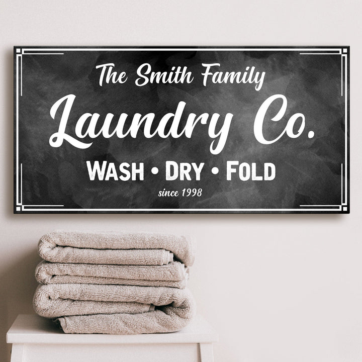Family Laundry Company Sign