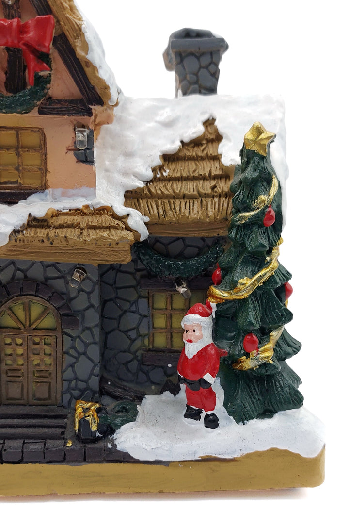 Festive Cottage with Santa Claus. Christmas Village Wizardi F07-N1-11-601