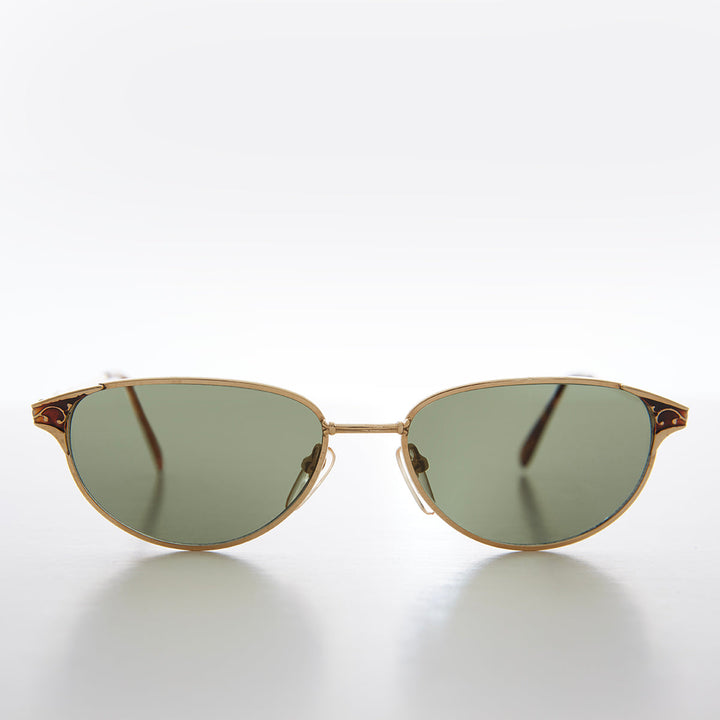 Elegant 90s Gold Sunglasses - Puck