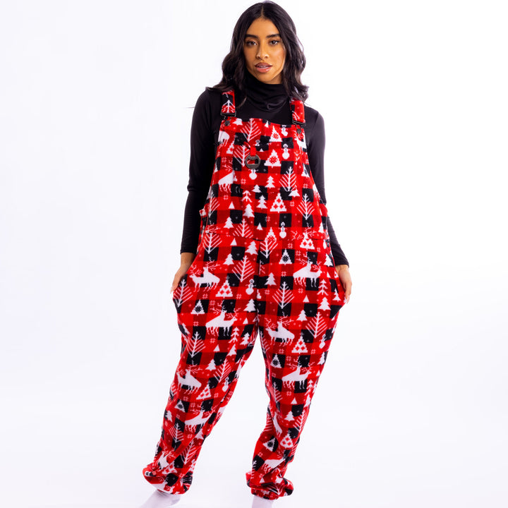 Person wearing a red pajama set with black and white patterns shinesty