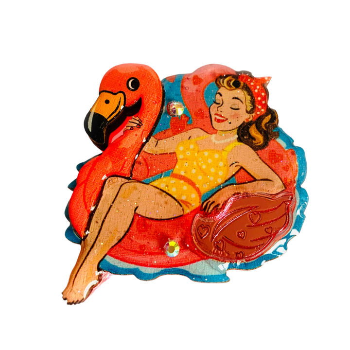 Pin-up girl with flamingo float brooch