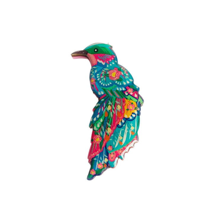 'The beautiful illustrated bird brooch' A beautiful illustrated bird brooch for your summer outfits or to perch perfectly on any jacket. Created in colourful detail with a baby pink acrylic back and stainless steel pin. Stunningly vibrant and to make you feel just incredible. Makes such a wonderful gift for bird lovers too! Brooch basics * Measurements 5cm 3cm * Baby pink acrylic backing with Rosie Rose Parker logo. * Beautiful bird theme made from an original illustration. * Laser cut wood with glass resin