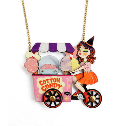 Necklace with a cotton candy cart and girl pendant on a white background