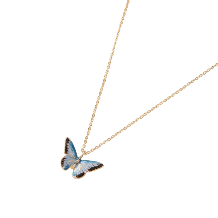 A gold-plated chain necklace with a hand-painted blue butterfly enamel charm.