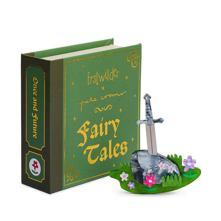 Green book titled 'Fairy Tales' with a sword and stone on a white background