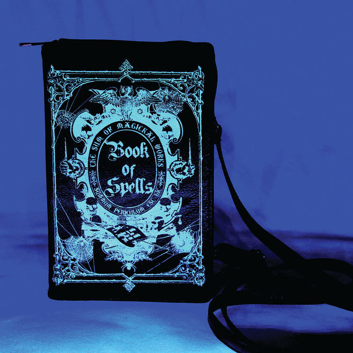 Glow In The Dark Book Of Spells Crossbody Bag In Vinyl Material by Book Bags