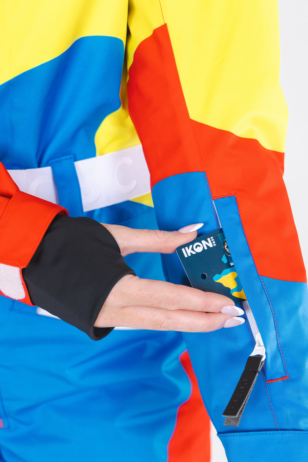 The Groovy Gondola | Orange Retro Swirl Women's One Piece Ski Suit