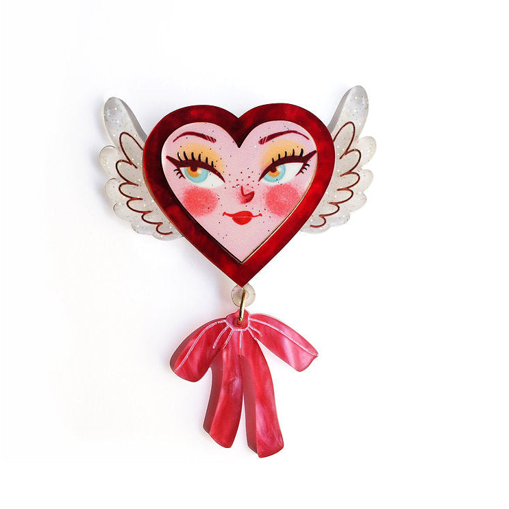 Heart-shaped character with wings and a bow on a white background