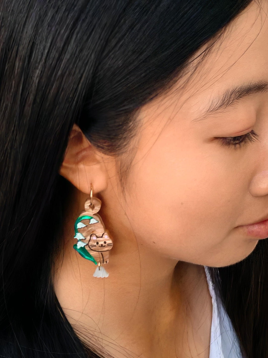 Orange Cat with Lily of the Valley Flower