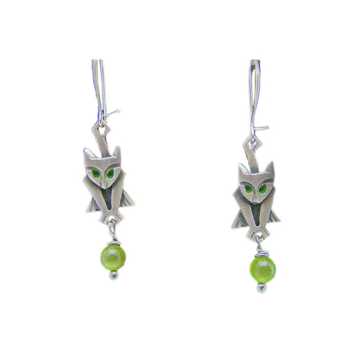 Chickenscratch Kitty Earrings — cast sterling silver cat charm earrings with enamel painted eyes and green glass bead dangle, locking sterling silver kidney wires