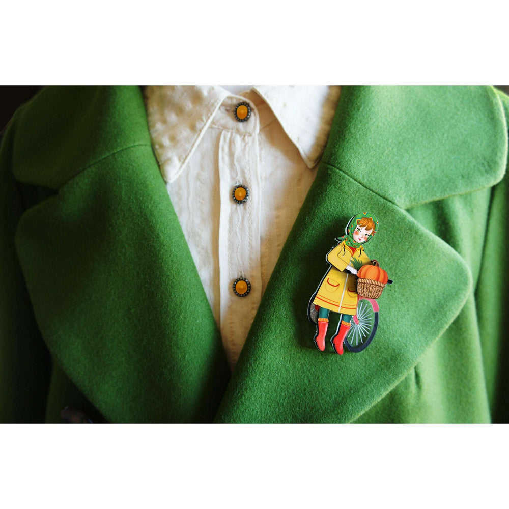 Girl with bicycle brooch by Laliblue