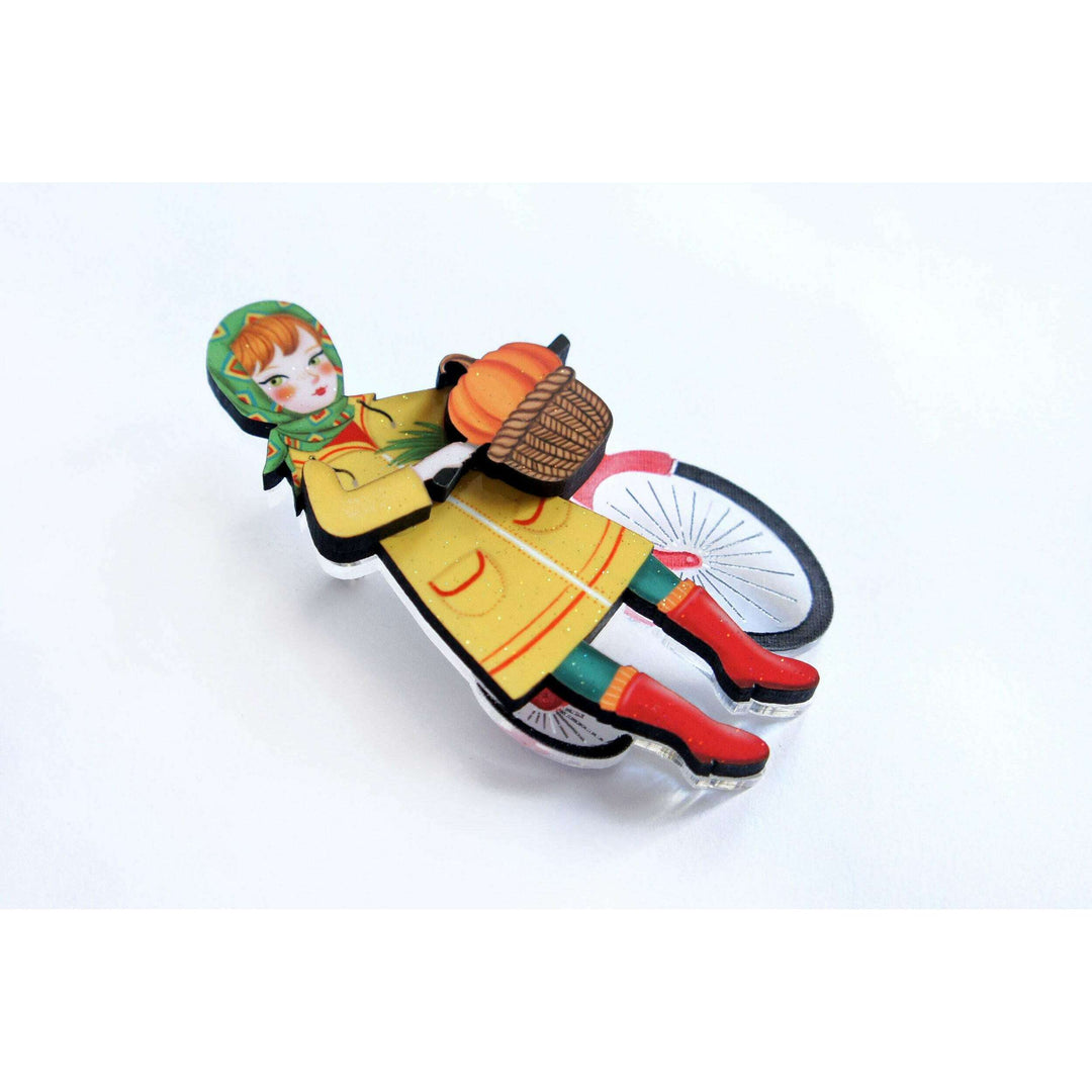 Girl with bicycle brooch by Laliblue