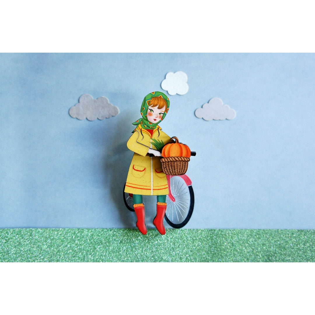 Girl with bicycle brooch by Laliblue