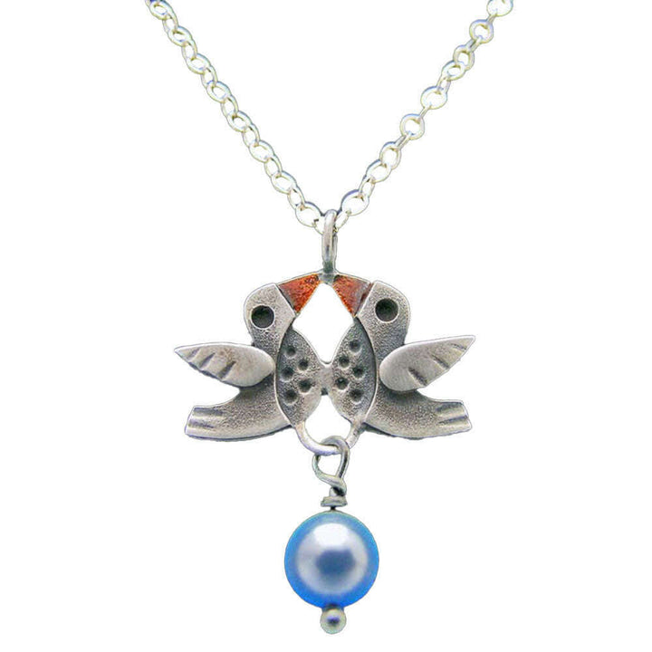 Chickenscratch Lovebirds Necklace — cast sterling silver double bird charm necklace with orange enamel accents and blue glass pearl dangle on 18-inch sterling silver chain