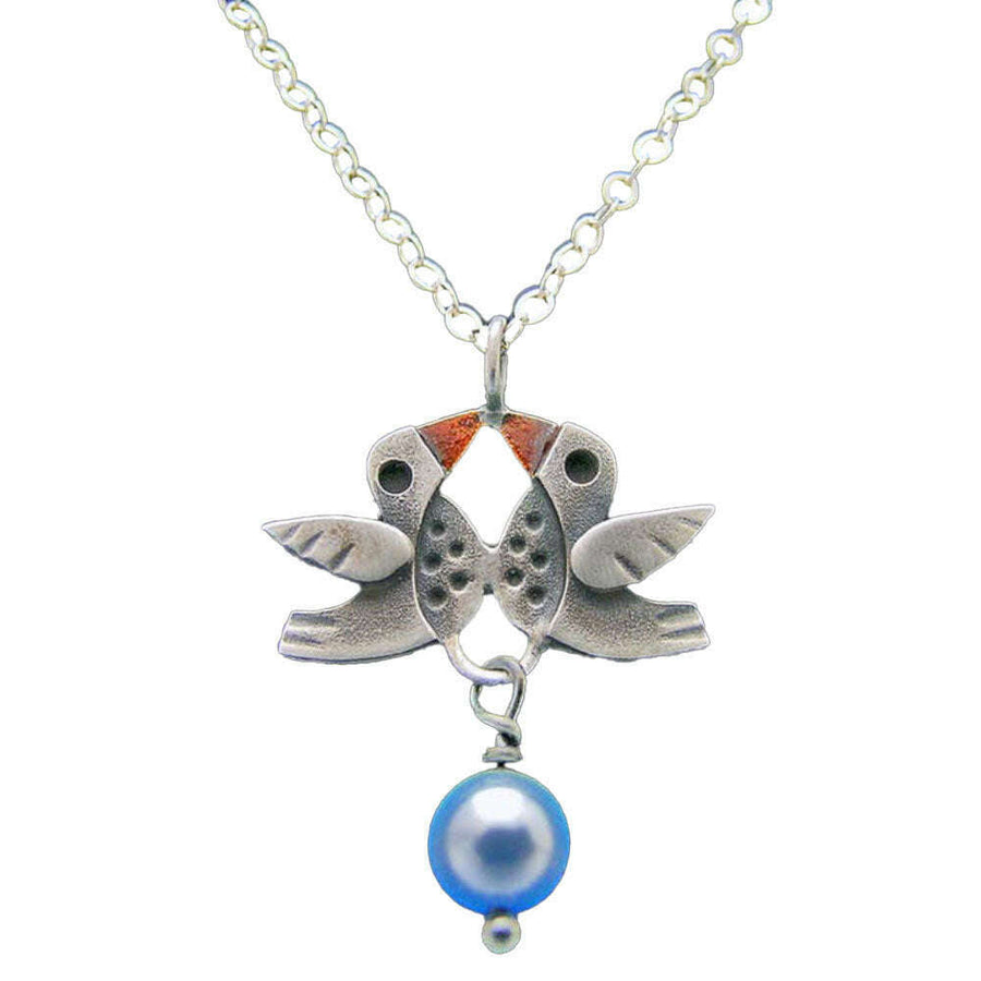 Chickenscratch Lovebirds Necklace — cast sterling silver double bird charm necklace with orange enamel accents and blue glass pearl dangle on 18-inch sterling silver chain