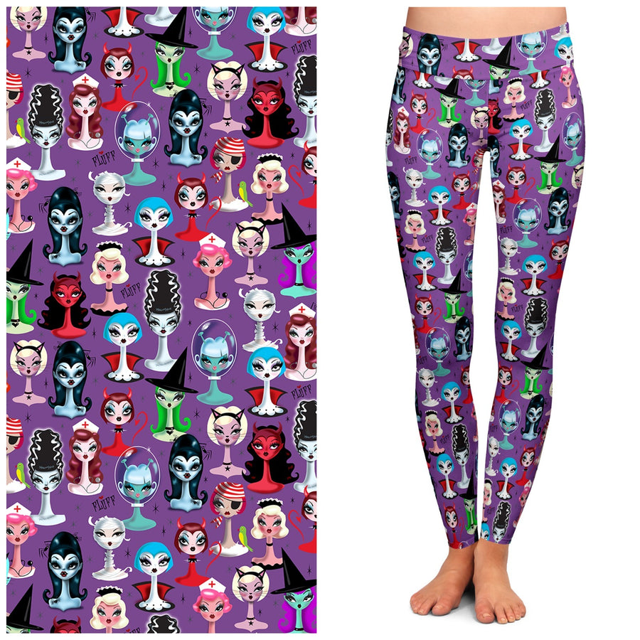 A pair of purple leggings featuring a repeated pattern of various character illustrations in a Halloween theme.
