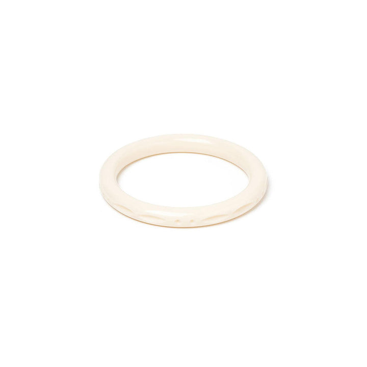 Narrow Cream Heavy Carve Bangle by Splendette image