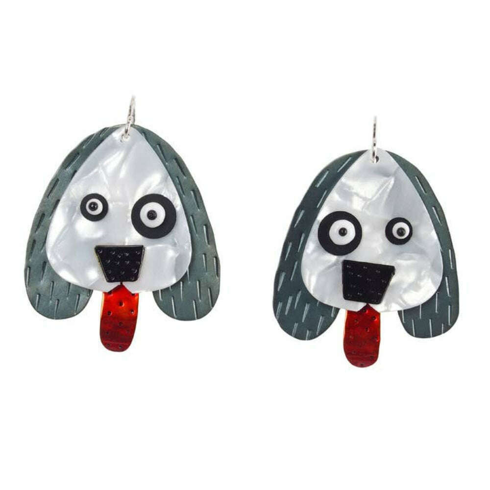 Chickenscratch Pooch Dog Earrings — handmade white guitar pick dog earrings with blackened swinging ears, red enamel tongue, and mismatched eyes, sterling silver ear wires