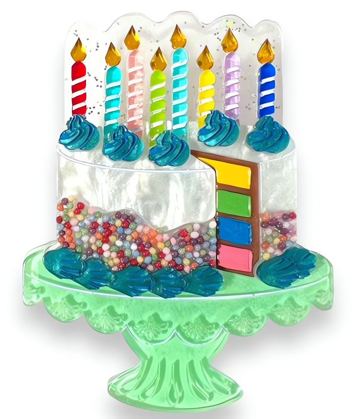 Colorful birthday cake brooch with candles and sprinkles