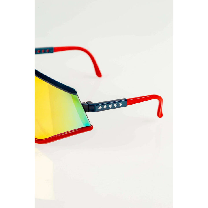 The Cornea Combusters | Red And Blue Revo Retro Macho Sunglasses