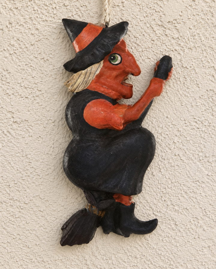 Vintage witch hanging Halloween wall decor.