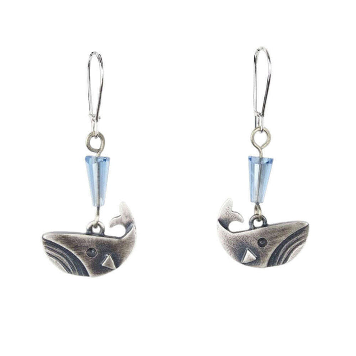 Chickenscratch Whale Earrings — cast sterling silver whale charms with faceted fumed blue glass bead spout, locking sterling silver ear wires
