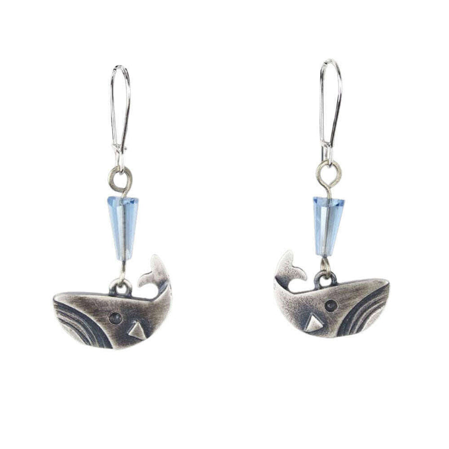 Chickenscratch Whale Earrings — cast sterling silver whale charms with faceted fumed blue glass bead spout, locking sterling silver ear wires