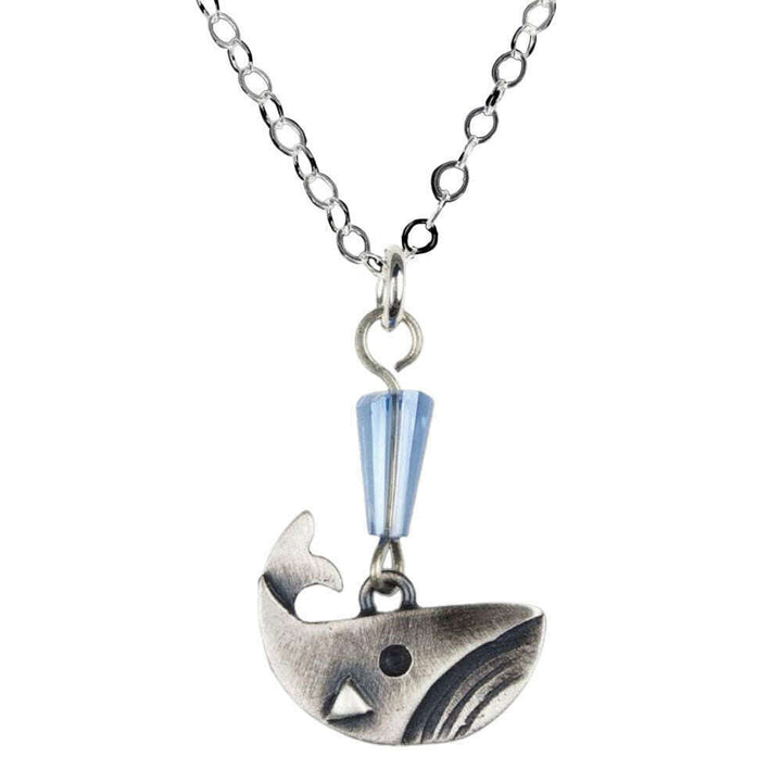 Chickenscratch Whale Necklace — cast sterling silver whale charm necklace with faceted fumed blue glass spout on 18-inch sterling silver chain