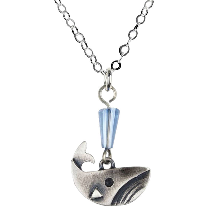 Chickenscratch Whale Necklace — cast sterling silver whale charm necklace with faceted fumed blue glass spout on 18-inch sterling silver chain