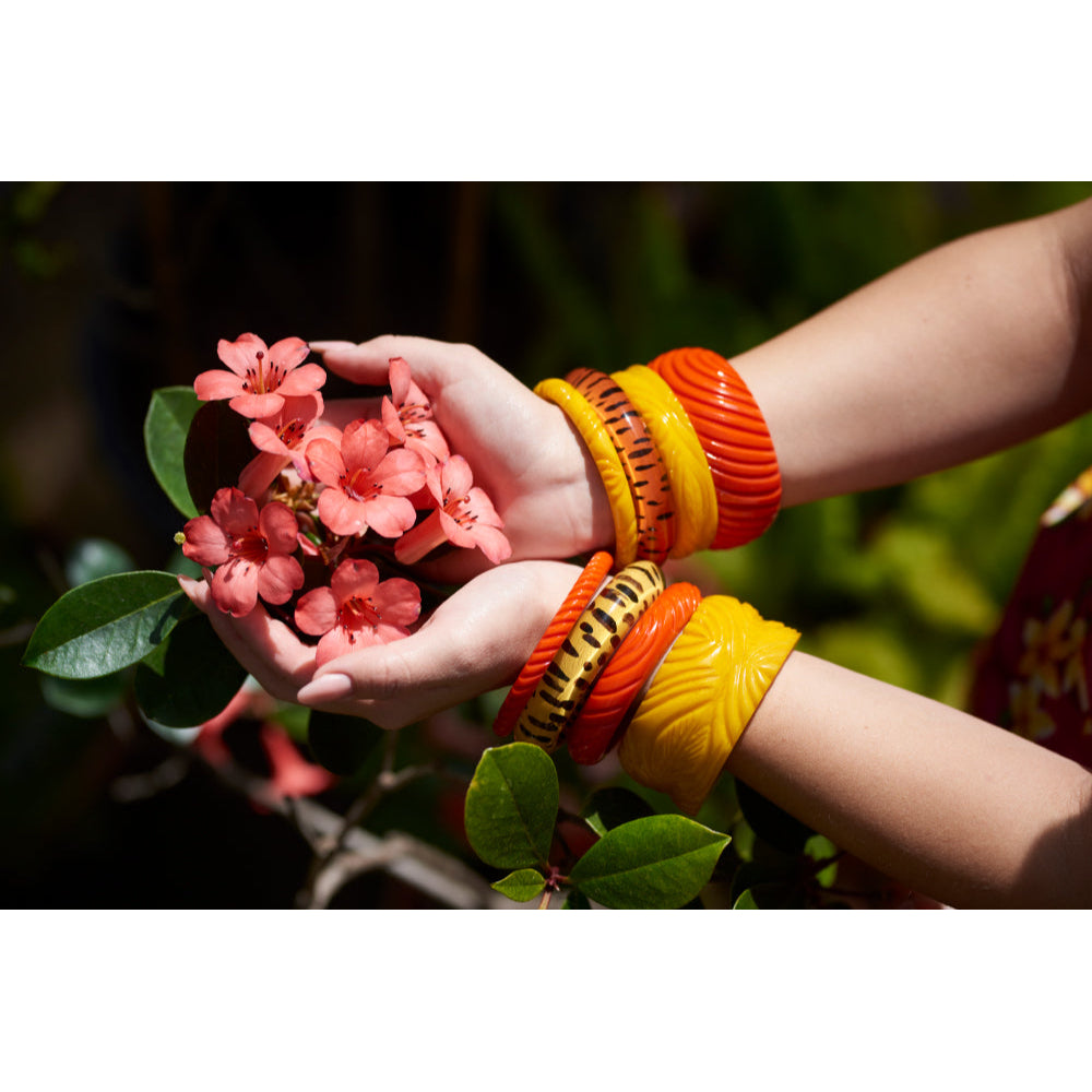 Wide Papaya Heavy Carve Fakelite Bangle by Splendette  1