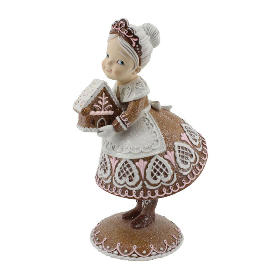 Gingerbread Mrs Claus Holding Gingerbread House by December Diamonds