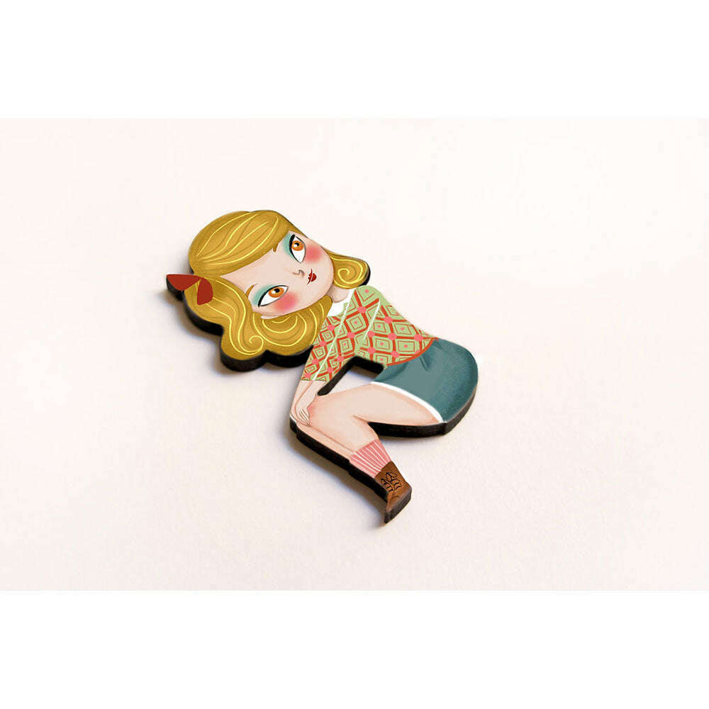 Puzzle with blonde girl brooch